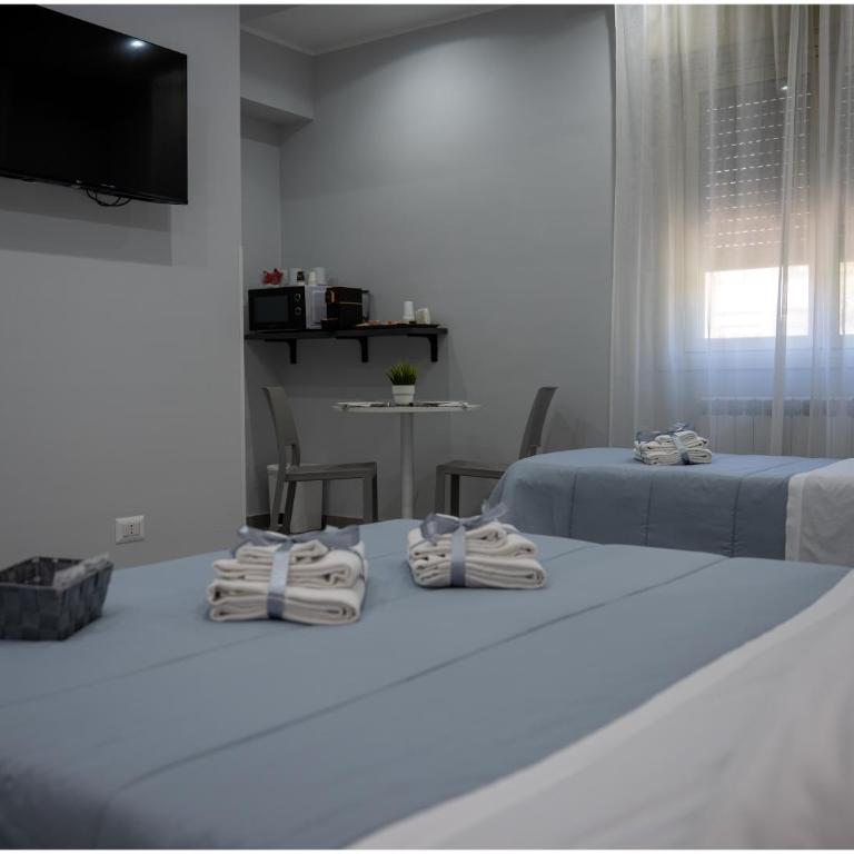 Richard Room & Apartment Policlinico - Deluxe Triple Room - 4