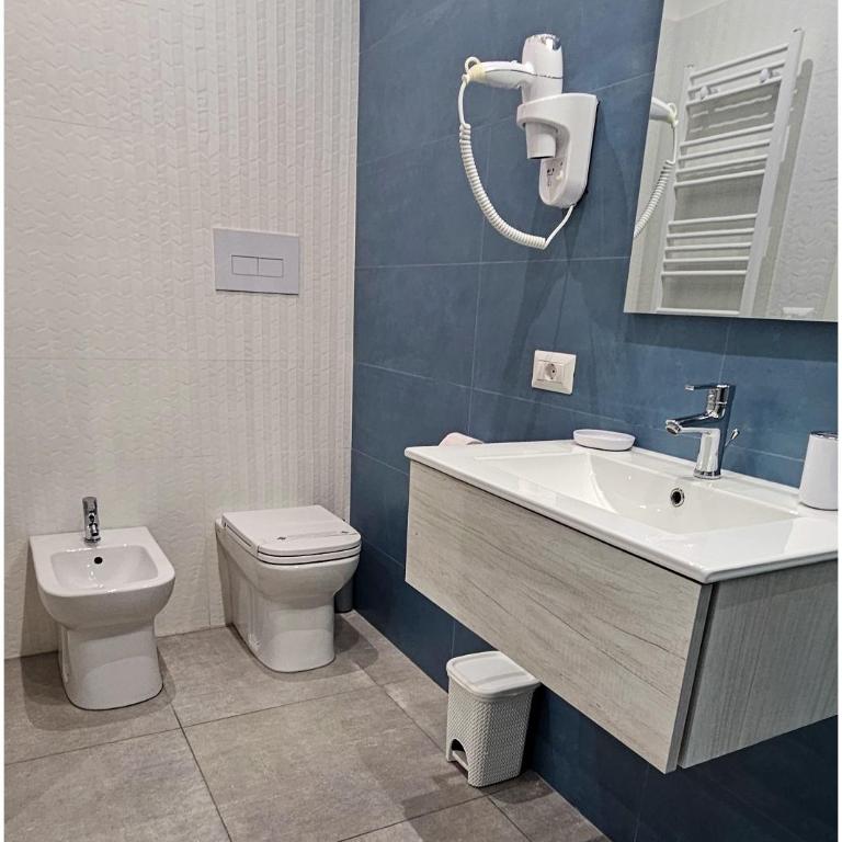 Richard Room & Apartment Policlinico - Deluxe Triple Room - 14