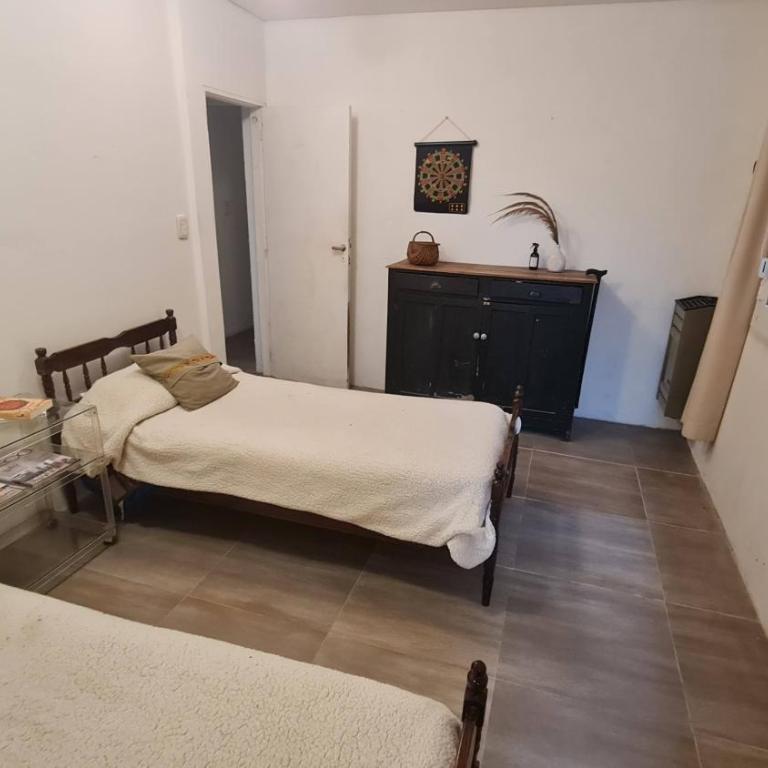 Casa frente a las Sierras, jardín verde y parrilla- Zona Los Cardos Rugby Club - Casa de 2 dormitorios - 10