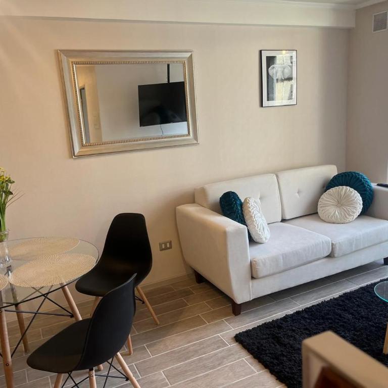 Depto nuevo, cerca de mall, estacionamiento gratis - Two-Bedroom Apartment - 2