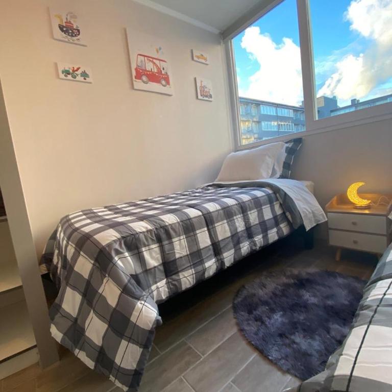 Depto nuevo, cerca de mall, estacionamiento gratis - Two-Bedroom Apartment - 8