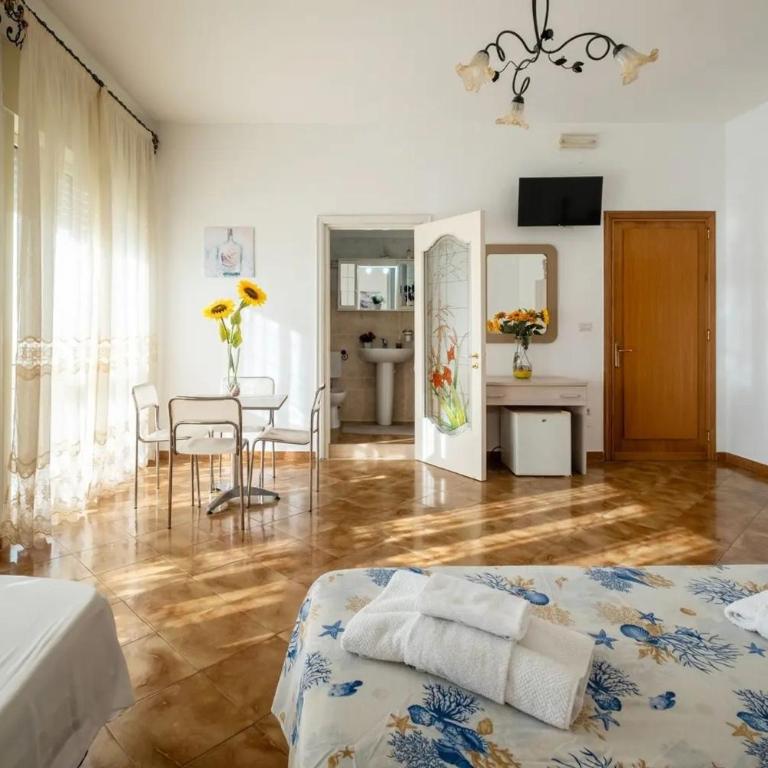 Abissi Room Vista mare Bb Controvento - Camera Familiare - 31