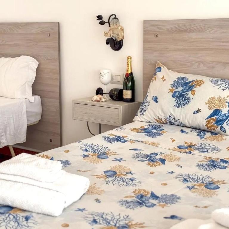 Abissi Room Vista mare Bb Controvento - Camera Familiare - 30