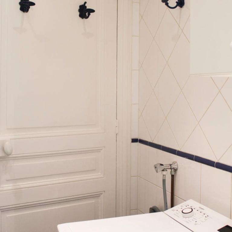 Appartement intemporel dans un immeuble hausmanien - Appartement - 34