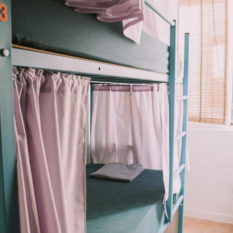 Kite and Surf - Private rooms - Cama en habitación compartida mixta de 6 camas - 4