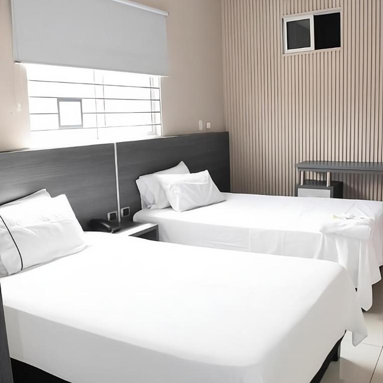Hotel Doral Inn - Habitación Doble - 2 camas - 6