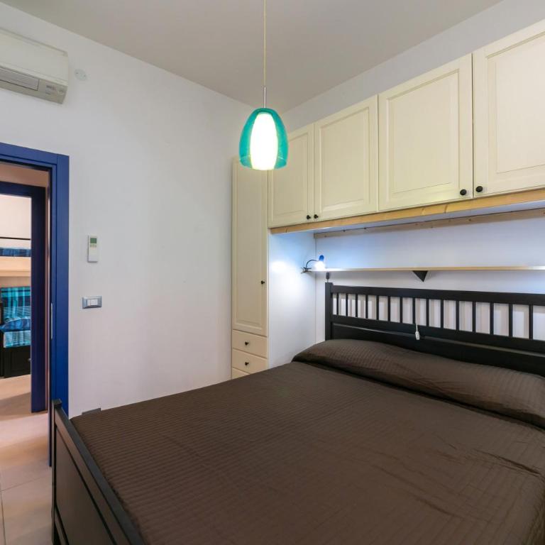 Condominio La Villa - Appartamento con 2 Camere da Letto e Vista Giardino - 17
