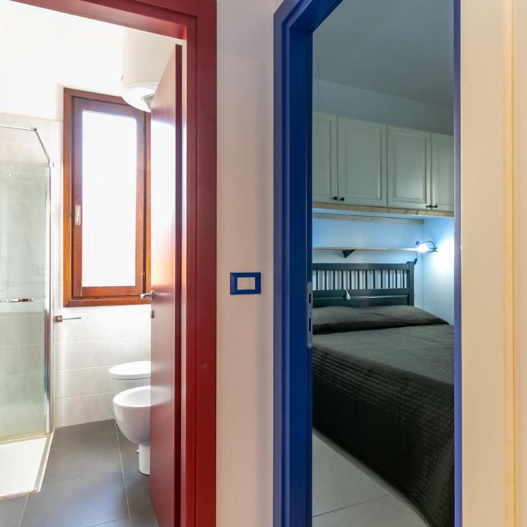 Condominio La Villa - Appartamento con 2 Camere da Letto e Vista Giardino - 16