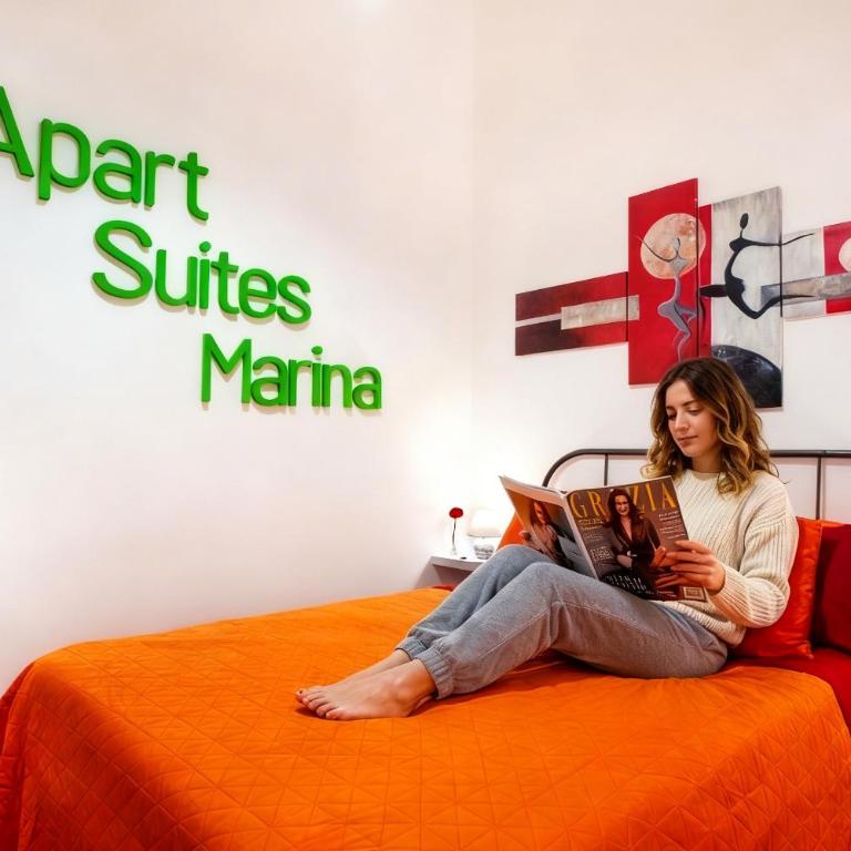 Apart Suites Marina - Camera Matrimoniale Deluxe con 1 Letto Supplementare - 8