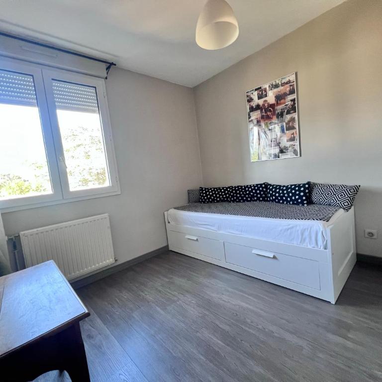 Vue cité - Appartement 2 Chambres - 10