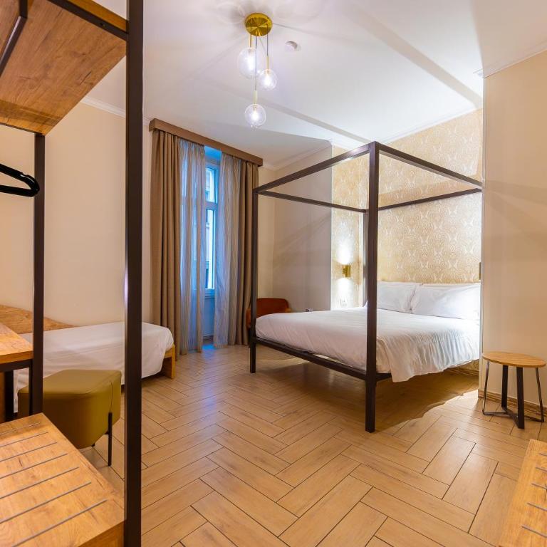 Four Rivers Suites - Chambre Triple Classique - 5