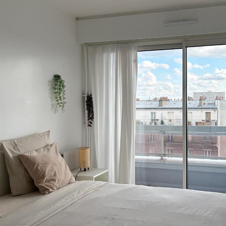 Dans le 19ème de Paris avec vue sur toute la ville - Appartement 2 Chambres - 13
