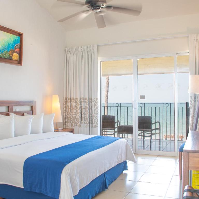 Grand Decameron Complex Bucerias, A Trademark All-Inclusive Resort - Habitación con cama extragrande y vistas frontales al océano - 1