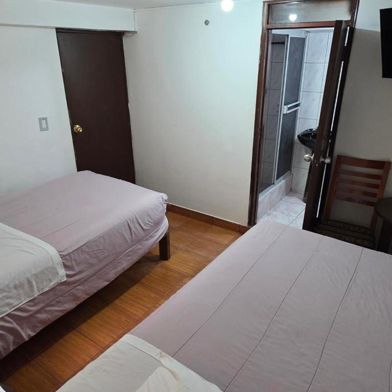 Tierra Mágica Hostal - Habitación Doble - 2 camas - 4