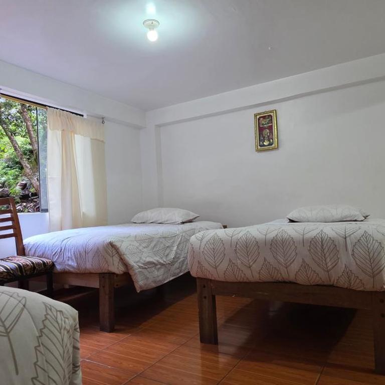 Tierra Mágica Hostal - Habitación Familiar - 1