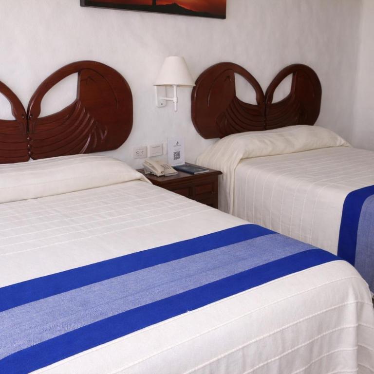 Hotel Quijote Inn - Habitación Doble - 2 camas dobles - 4