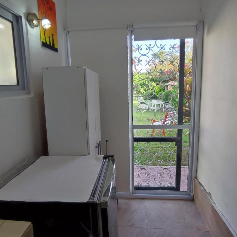 Alojamiento con pileta a 5 minutos del estadio y nodo tecnológico - Apartamento de 1 dormitorio - 17