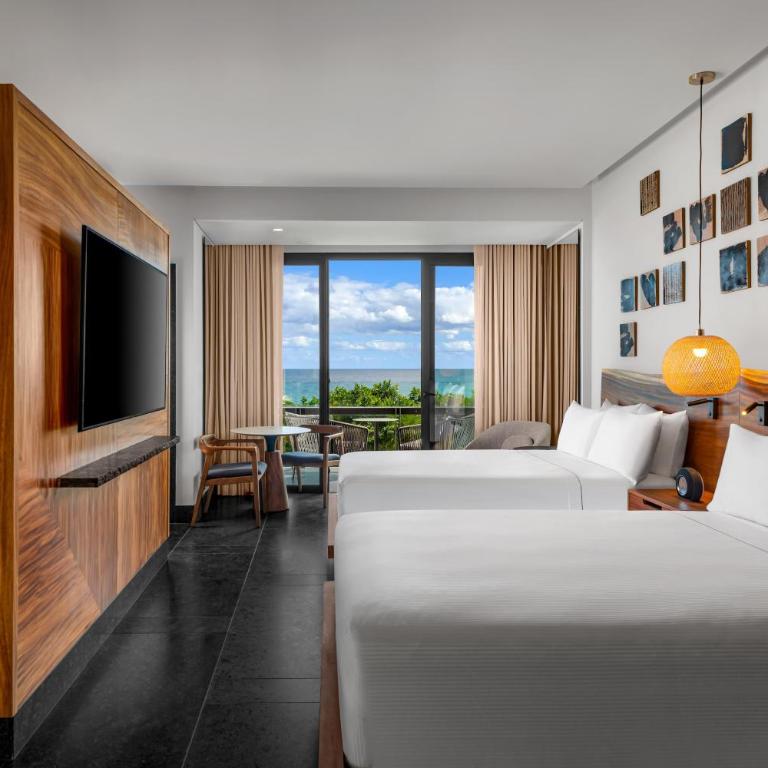 Conrad Tulum Riviera Maya - Habitación Doble con 2 camas dobles y vistas parciales al mar - 2
