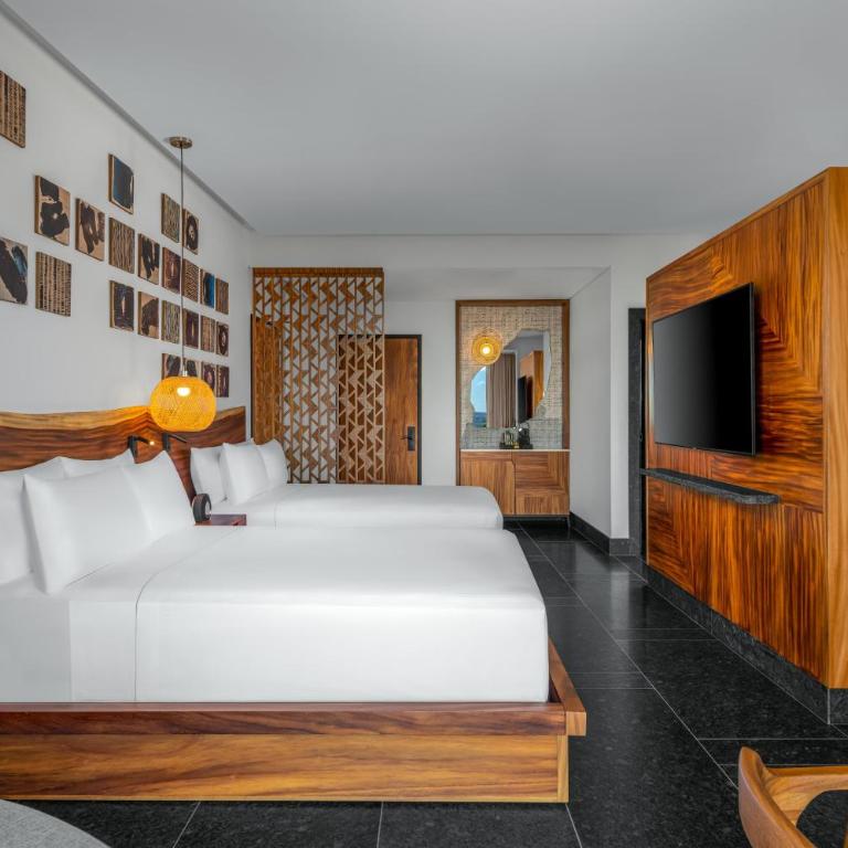Conrad Tulum Riviera Maya - Habitación Doble con 2 camas dobles y vistas parciales al mar - 4