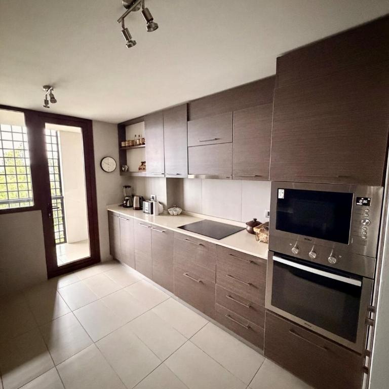 Departamento Premium Frente al Lago y Volcanes Terraza Panorámica - Three-Bedroom Apartment - 8