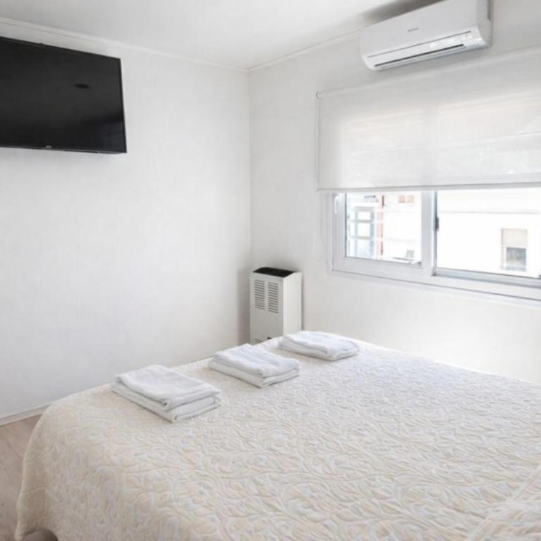 Entrada Host - Habitación Doble Deluxe - 1 o 2 camas - 7