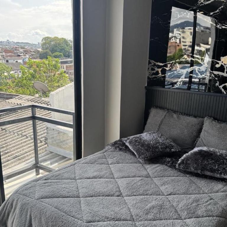 Apartasuite moderno con balcón excelente ubicación - One-Bedroom Apartment - 22