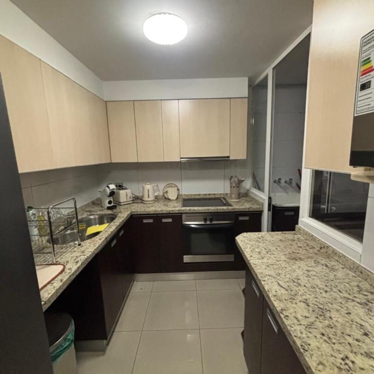 Parque Arauco Elegant apartment with balcony and pool - Two-Bedroom Apartment - 20