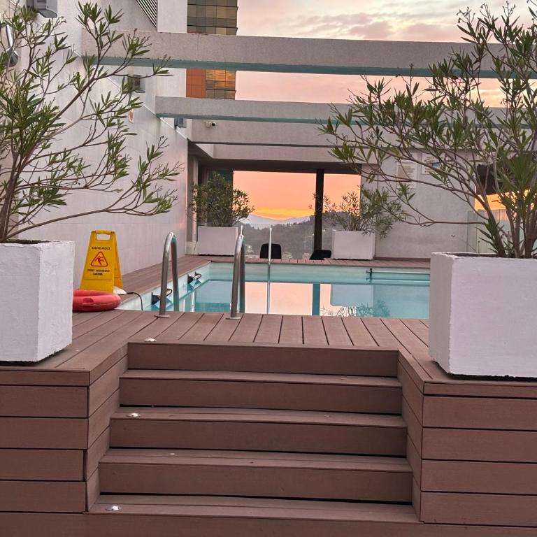 Parque Arauco Elegant apartment with balcony and pool - Two-Bedroom Apartment - 30