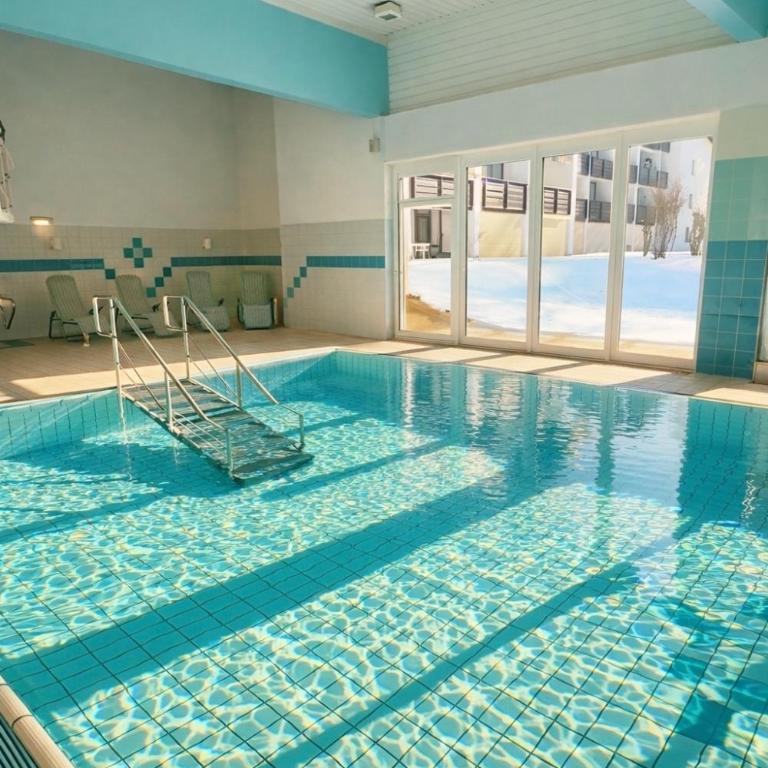 Tonis Appartements Lofer - Sylt Ferienwohnung mit Pool & Bergblick - Apartment mit 1 Schlafzimmer - 18