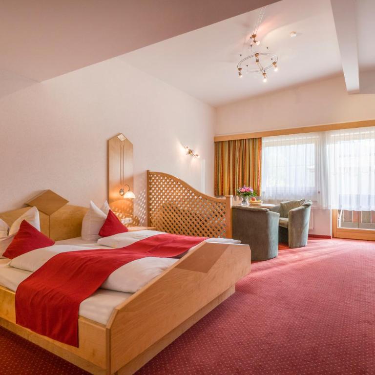 Hotel Enzian - Apartment mit Gartenblick - 9