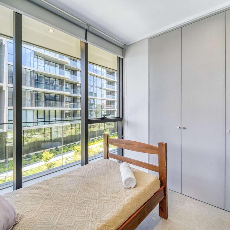Signature Home Comfy Apartment With Pool and Balcony - Three-Bedroom Apartment - 18