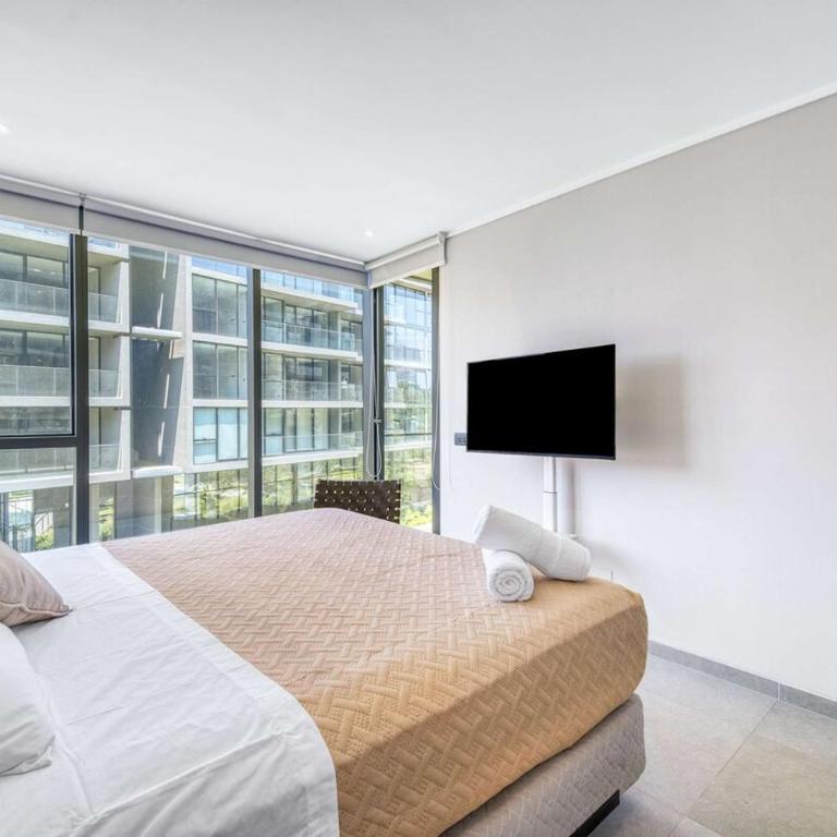 Signature Home Comfy Apartment With Pool and Balcony - Three-Bedroom Apartment - 20