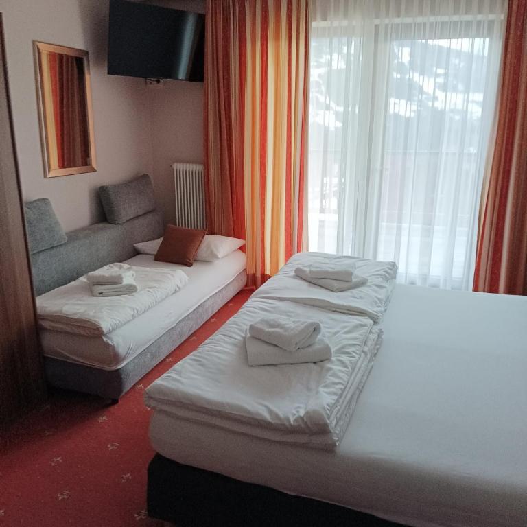 Pension Savisalo - Chambre Double Deluxe (2 Adultes + 1 Enfant) - 4