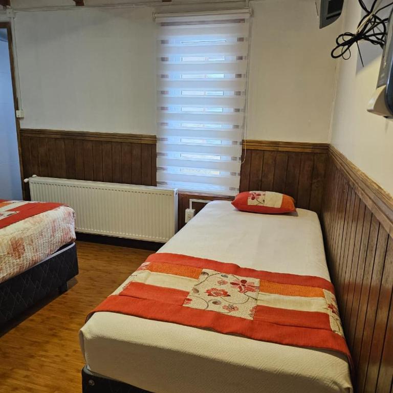 Hostal PATAGONICA - Standard Triple Room - 4