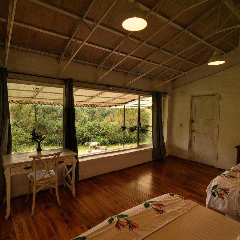Rancho con Caballos El Reencuentro - Habitación Doble con vistas a las montañas - 2 camas - 12