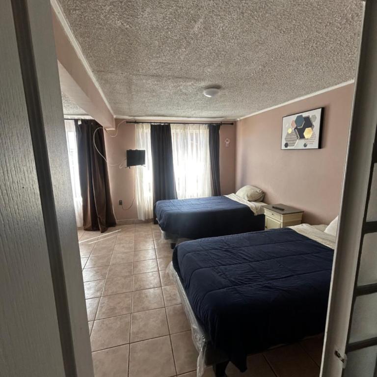 Alojamiento corporativo para grupos grandes Calama - Six-Bedroom House - 11