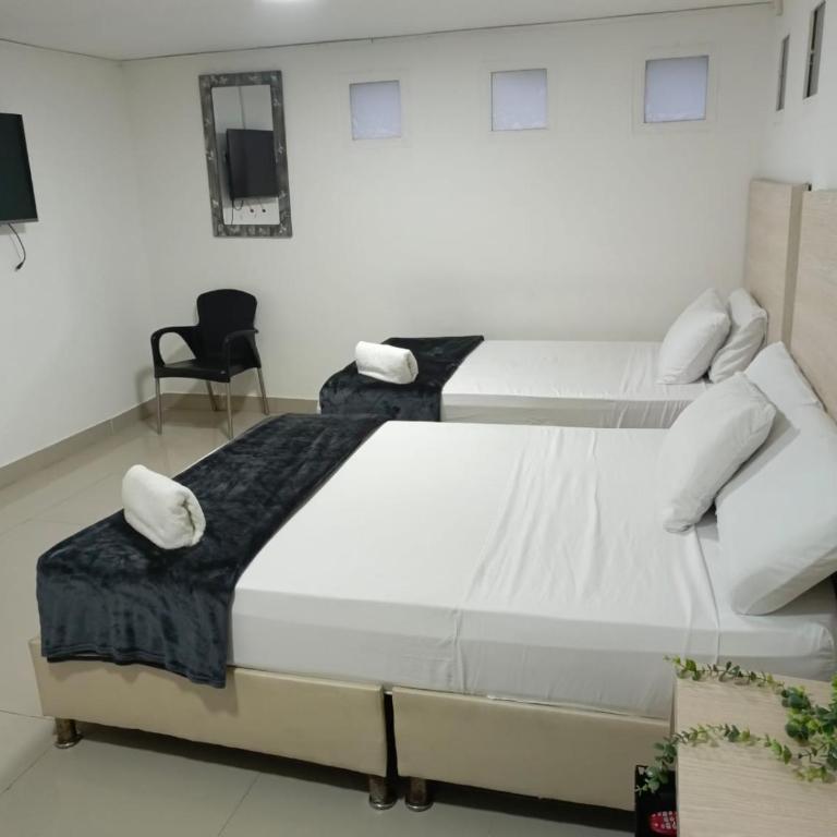 Hotel pasarela real cali - Habitación Triple Básica - 11