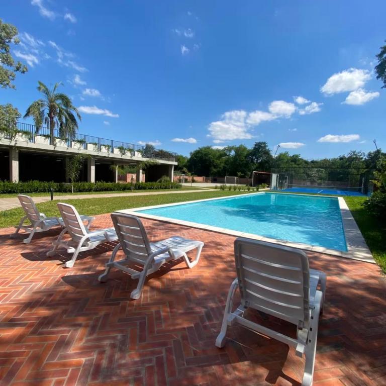 Monoambiente moderno con balcón, piscina en Luque - One-Bedroom Apartment - 49