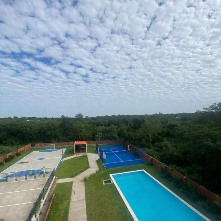 Monoambiente moderno con balcón, piscina en Luque - One-Bedroom Apartment - 14