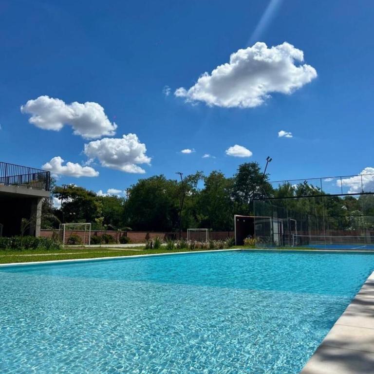 Monoambiente moderno con balcón, piscina en Luque - One-Bedroom Apartment - 13