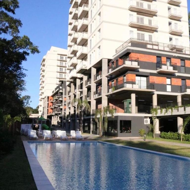 Monoambiente moderno con balcón, piscina en Luque - One-Bedroom Apartment - 9