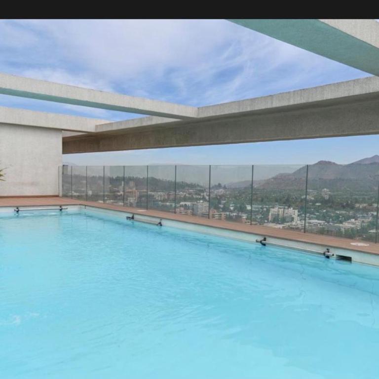 Parque Arauco Elegant apartment with balcony and pool - Two-Bedroom Apartment - 14