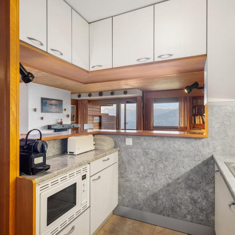 Gemeaux 205 sur la place du Village a Anzere avec vue sur les Alpes - Apartment - 13