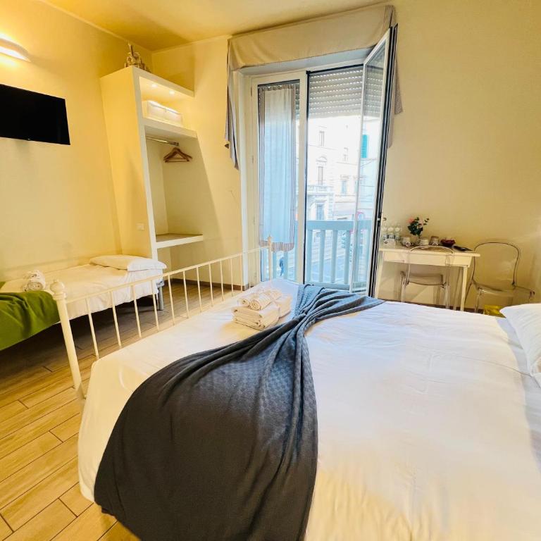 Bed & Bed Peterson - Triple Room - 1