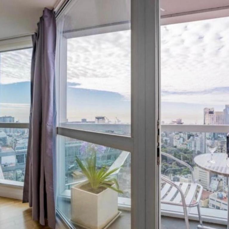 Departamento Premium en la famosa Torre Bellini, en el centro, con piscina, jacuzzi, gimnasio y vista increible a la ciudad de Buenos Aires, capacidad máxima 5 personas - Apartamento de 1 dormitorio - 23