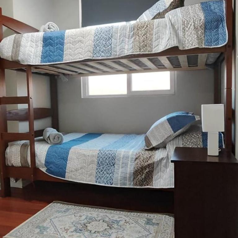 Acogedor departamento 4 camas con estacionamiento comuna macul metro camino agricola - Two-Bedroom Apartment with View - 22