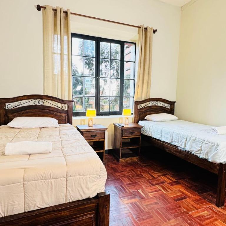 1825 Stay - Habitación Doble Deluxe - 2 camas - 12