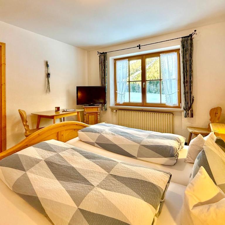 Landhaus Spielmannsau - Apartment mit 2 Schlafzimmern - 11