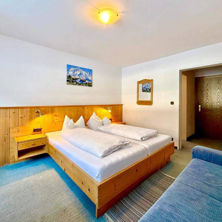 Landhaus Spielmannsau - Doppelzimmer mit Bergblick - 6