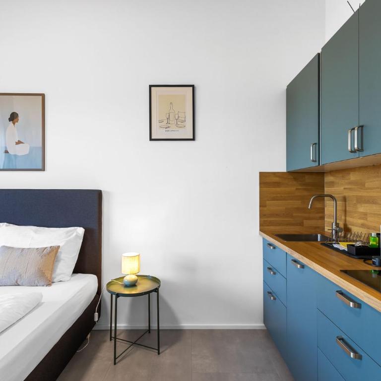 SKYRISE Apartments mit Küche, WLAN & Parkplatz - ruhige Lage - Studio mit Balkon - 10